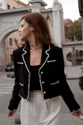 One lady was wearing an old money aesthetic black jacket.